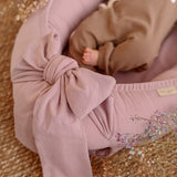 Discover our premium baby nest sleeper crafted with breathable linen and hypoallergenic fill. Provides a cozy, secure space for newborns.