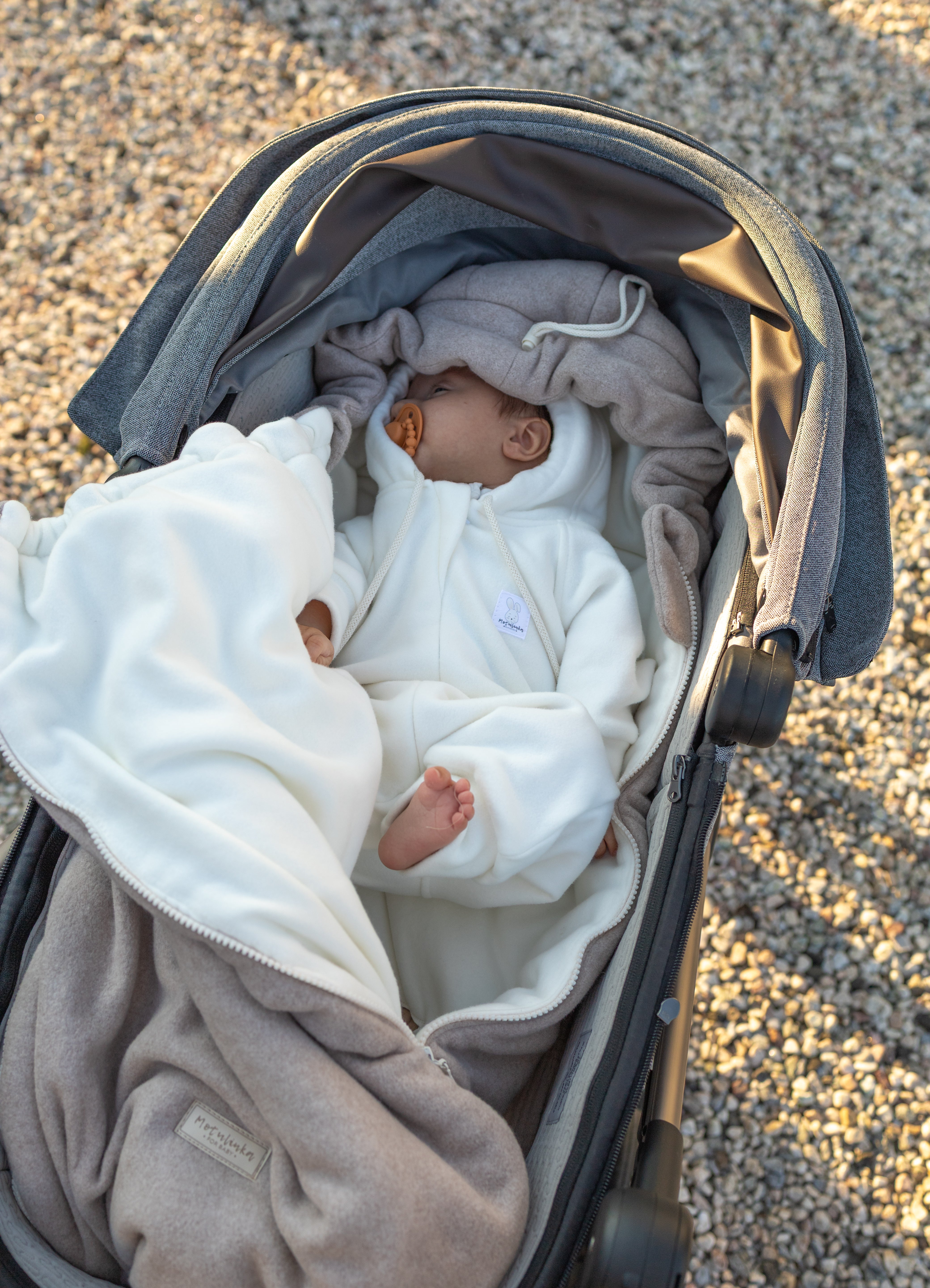 Keep your baby cozy year-round with our 3-in-1 Footmuff – Organic Cotton Baby Stroller Blanket. Soft, breathable, and perfect for strollers. CocoMi Boutique.