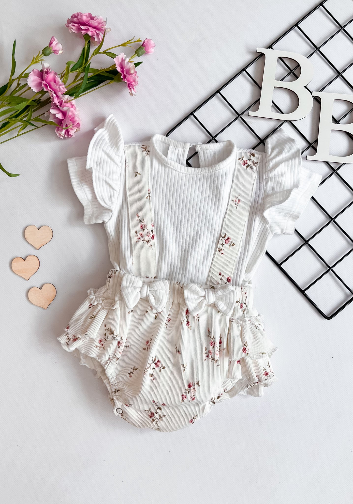 Soft and breathable, the Petal Bliss Short Sleeve Onesie keeps your baby comfy and cute. Ideal for everyday wear and special moments.