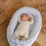 Discover our premium baby nest sleeper crafted with breathable linen and hypoallergenic fill. Provides a cozy, secure space for newborns.
