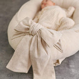 Discover our premium baby nest sleeper crafted with breathable linen and hypoallergenic fill. Provides a cozy, secure space for newborns.