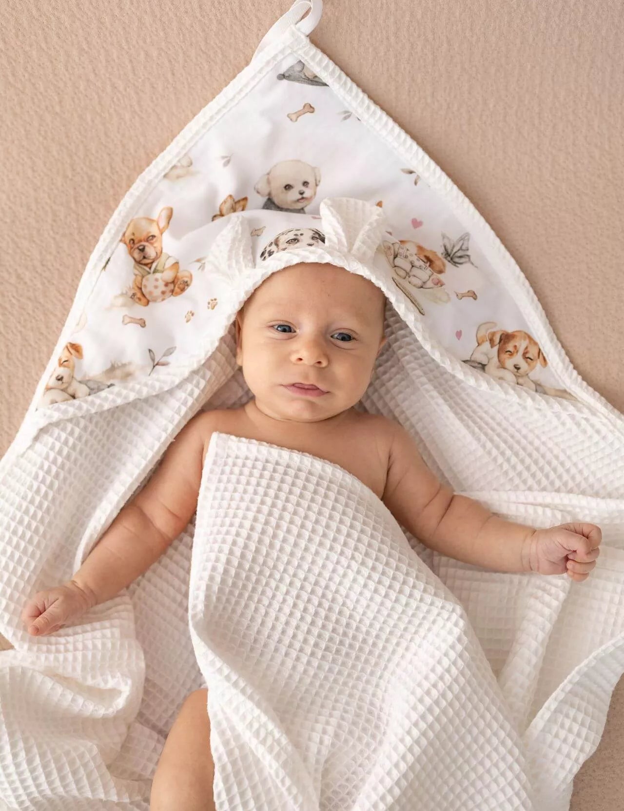 Wrap your little one in comfort with our Waffle Baby Hooded Bath Towel. Made from 100% natural cotton, it's ultra-soft, breathable, quick-drying.