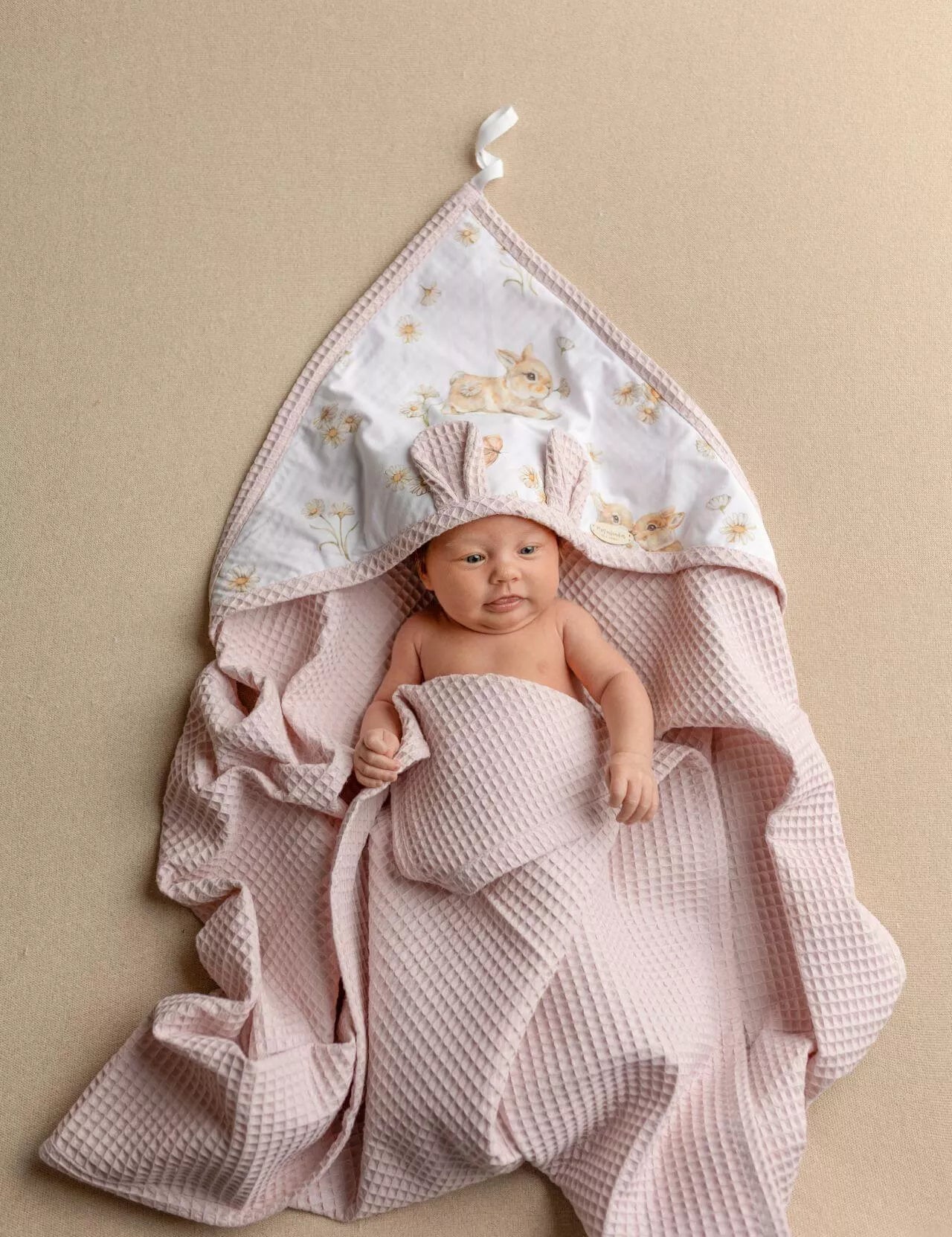 Wrap your little one in comfort with our Waffle Baby Hooded Bath Towel. Made from 100% natural cotton, it's ultra-soft, breathable, quick-drying.