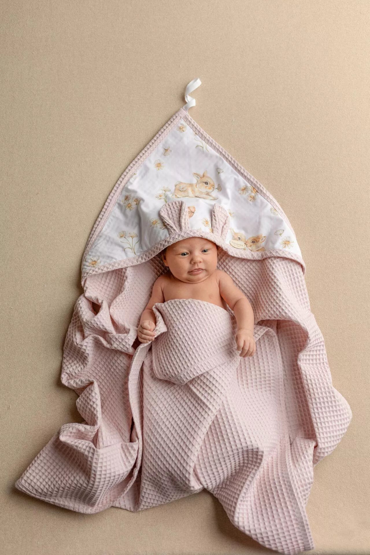 Wrap your little one in comfort with our Waffle Baby Hooded Bath Towel. Made from 100% natural cotton, it's ultra-soft, breathable, quick-drying.