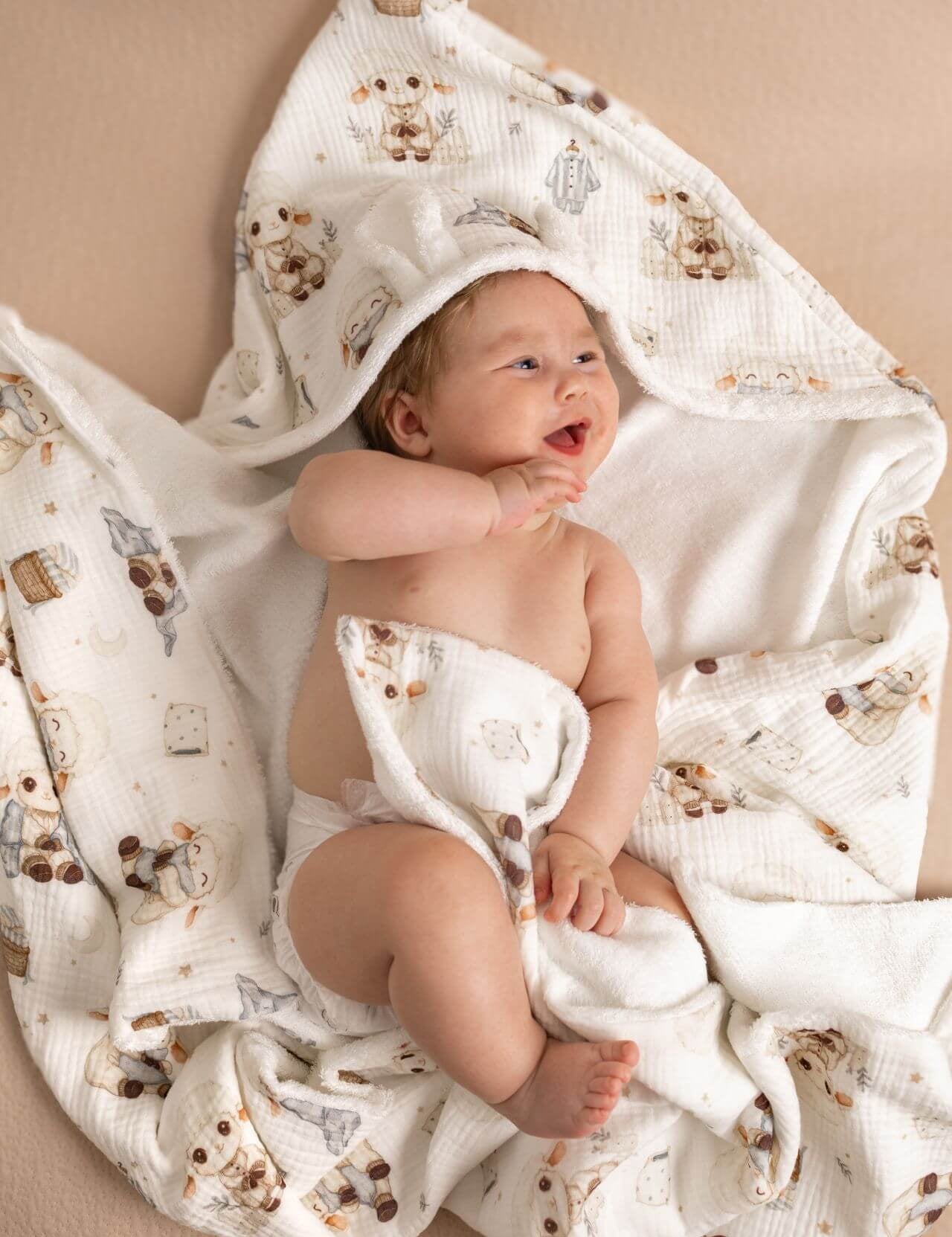 Wrap your baby in gentle comfort with our luxury bamboo baby towel. Made from bamboo terry and cotton muslin, it's hypoallergenic, and OEKO-TEX certified.
