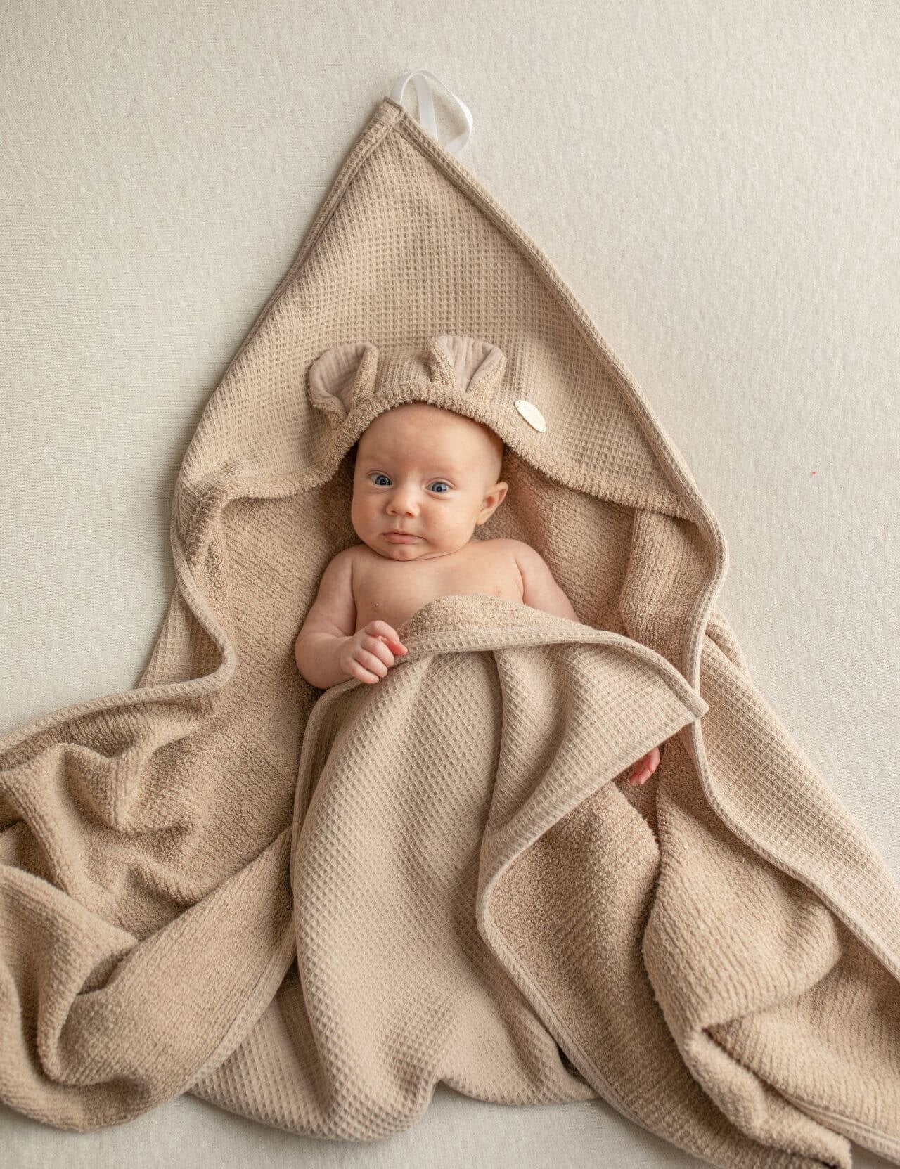 Keep your little one cozy with our Baby Terry Towel. Ultra-soft, highly absorbent, and gentle on delicate skin – perfect for bath time and everyday use.