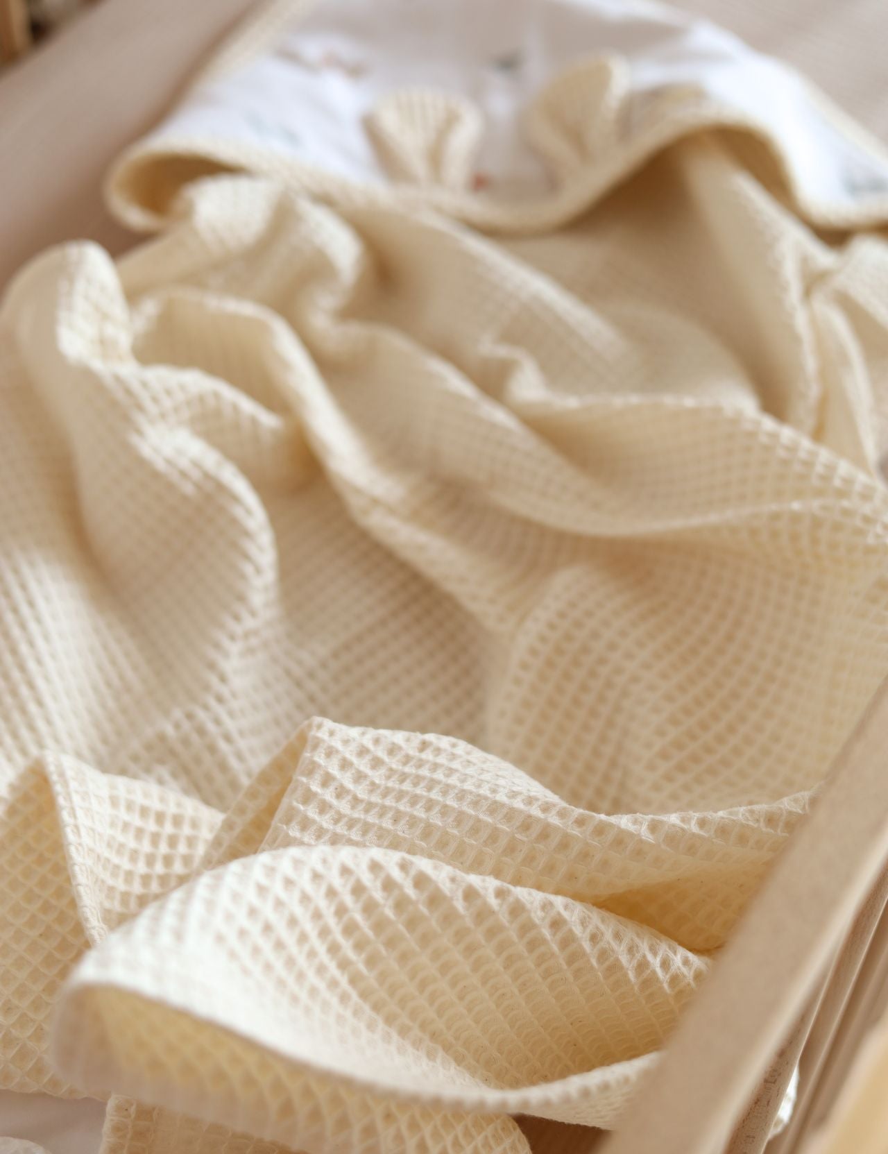 Wrap your little one in comfort with our Waffle Baby Hooded Bath Towel. Made from 100% natural cotton, it's ultra-soft, breathable, quick-drying.