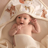 Wrap your little one in comfort with our Waffle Baby Hooded Bath Towel. Made from 100% natural cotton, it's ultra-soft, breathable, quick-drying.