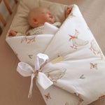 Wrap your baby in luxury with our Organic Cotton Swaddle Blanket. Made with 100% premium cotton, soft velvet lining & hypoallergenic fill.