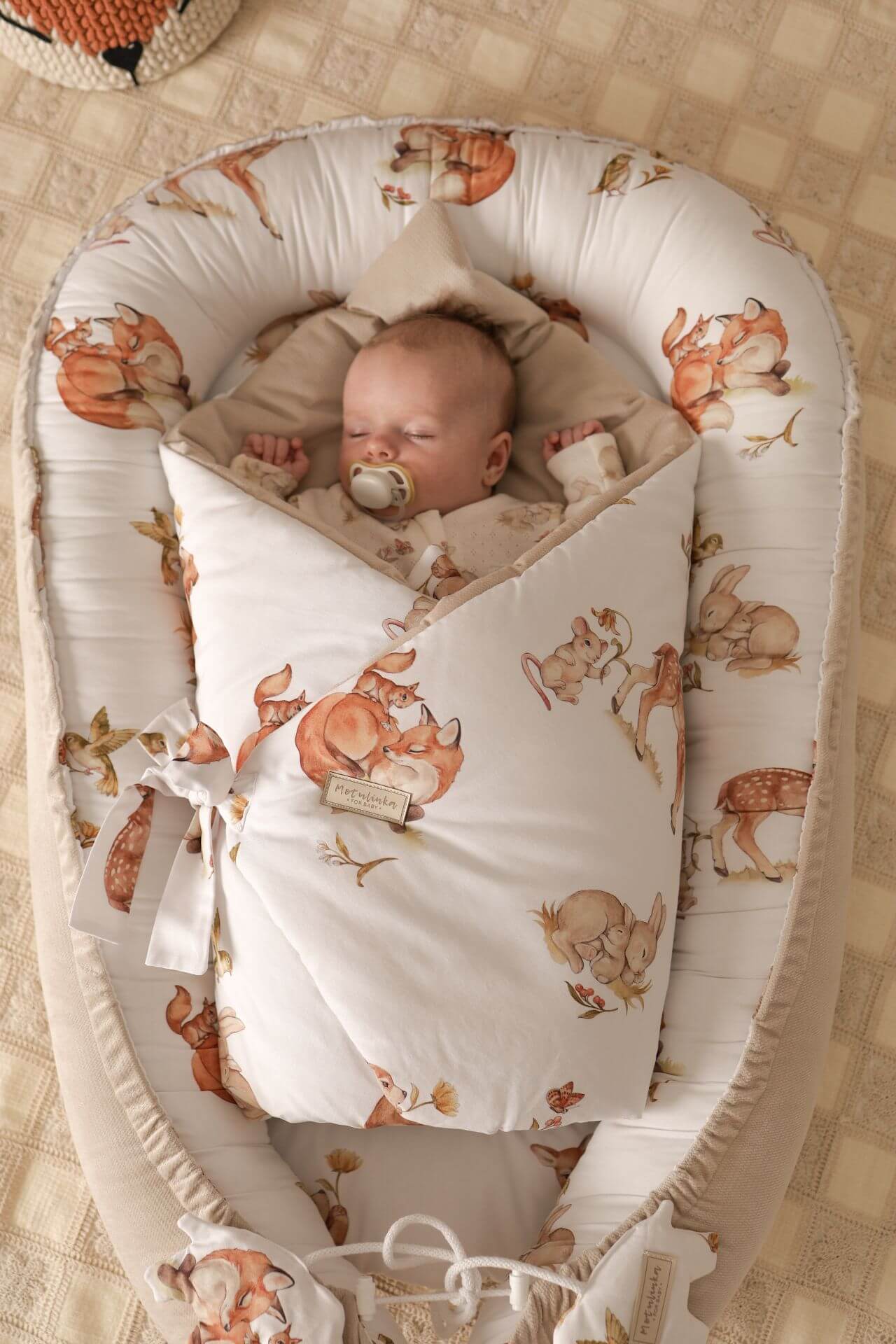 Wrap your baby in luxury with our Organic Cotton Swaddle Blanket. Made with 100% premium cotton, soft velvet lining & hypoallergenic fill.