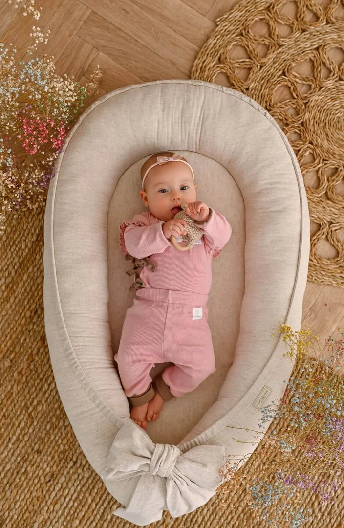Keep It Up: Why Elevated Loungers Like Rahoo and Babymoov Are Lifesavers