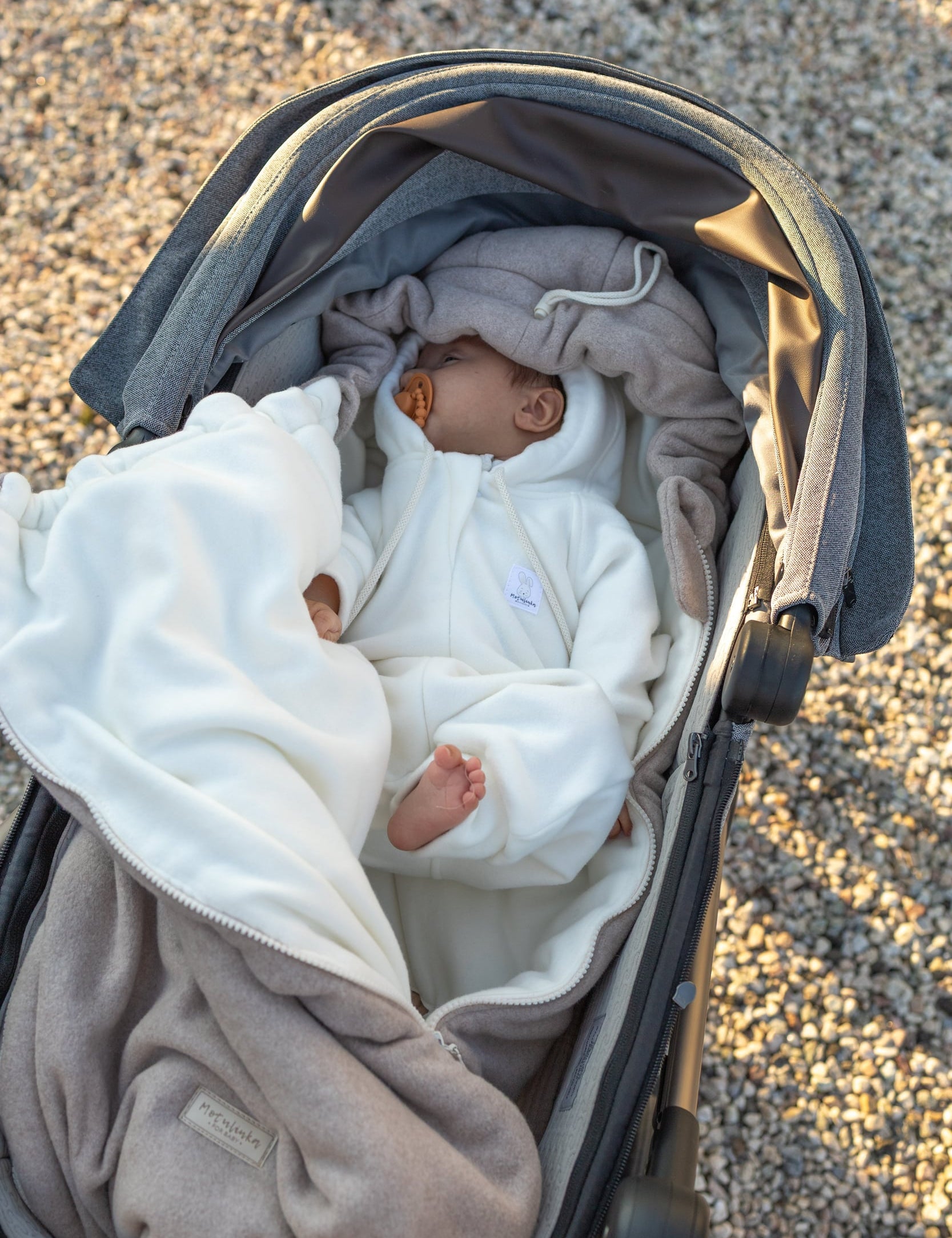 Keep your baby cozy year-round with our 3-in-1 Footmuff – Organic Cotton Baby Stroller Blanket. Soft, breathable, and perfect for strollers. CocoMi Boutique.