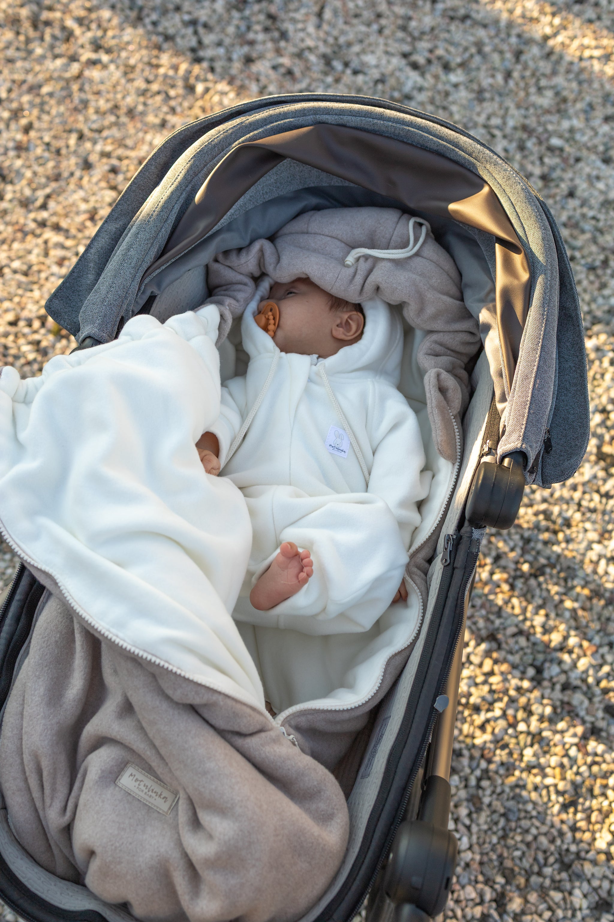 Keep your baby cozy year-round with our 3-in-1 Footmuff – Organic Cotton Baby Stroller Blanket. Soft, breathable, and perfect for strollers. CocoMi Boutique.