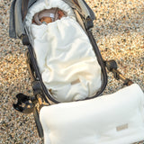 Keep your baby cozy year-round with our 3-in-1 Footmuff – Organic Cotton Baby Stroller Blanket. Soft, breathable, and perfect for strollers. CocoMi Boutique.
