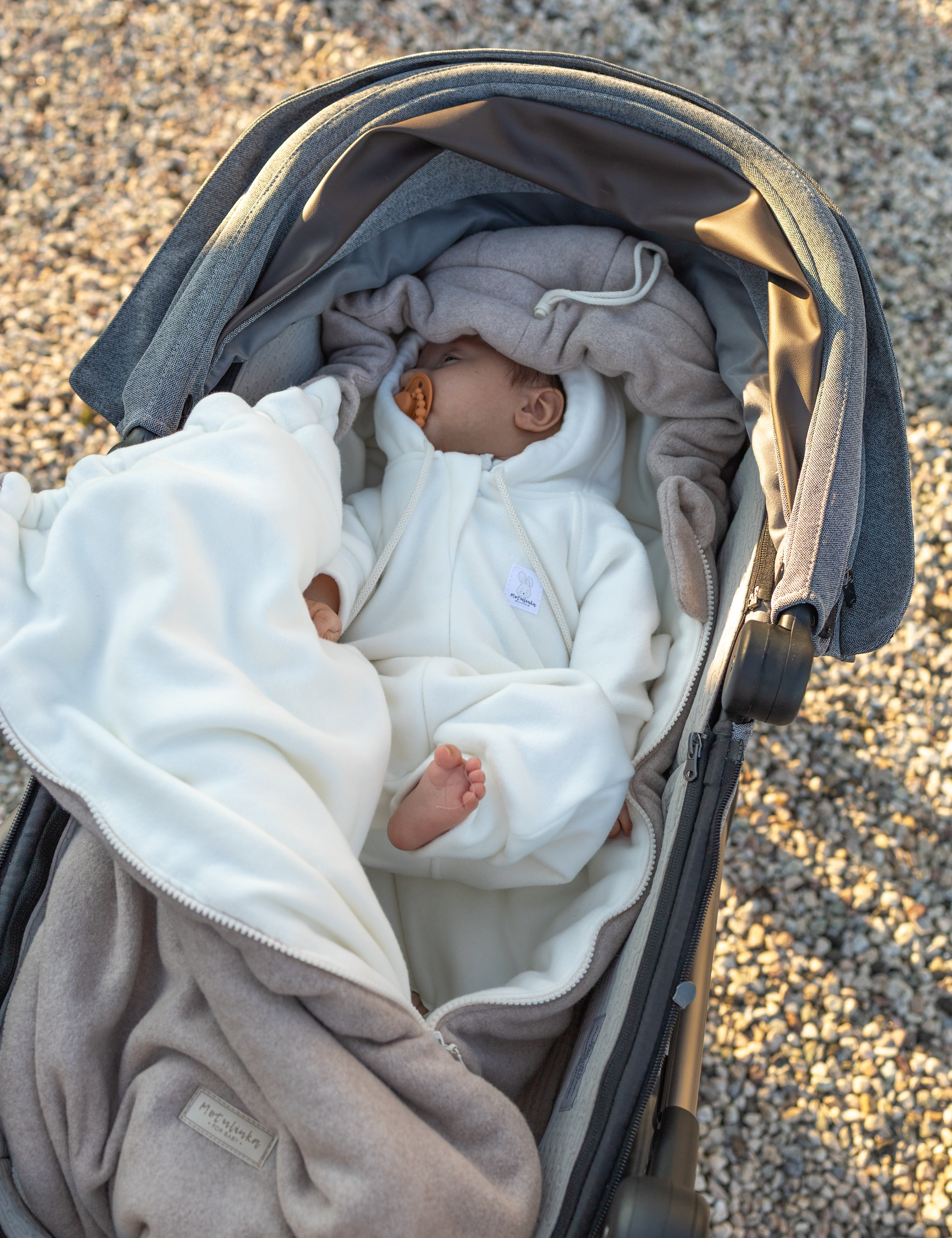 Keep your baby cozy year-round with our 3-in-1 Footmuff – Organic Cotton Baby Stroller Blanket. Soft, breathable, and perfect for strollers. CocoMi Boutique.