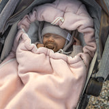 Keep your baby cozy year-round with our 3-in-1 Footmuff – Organic Cotton Baby Stroller Blanket. Soft, breathable, and perfect for strollers. CocoMi Boutique.