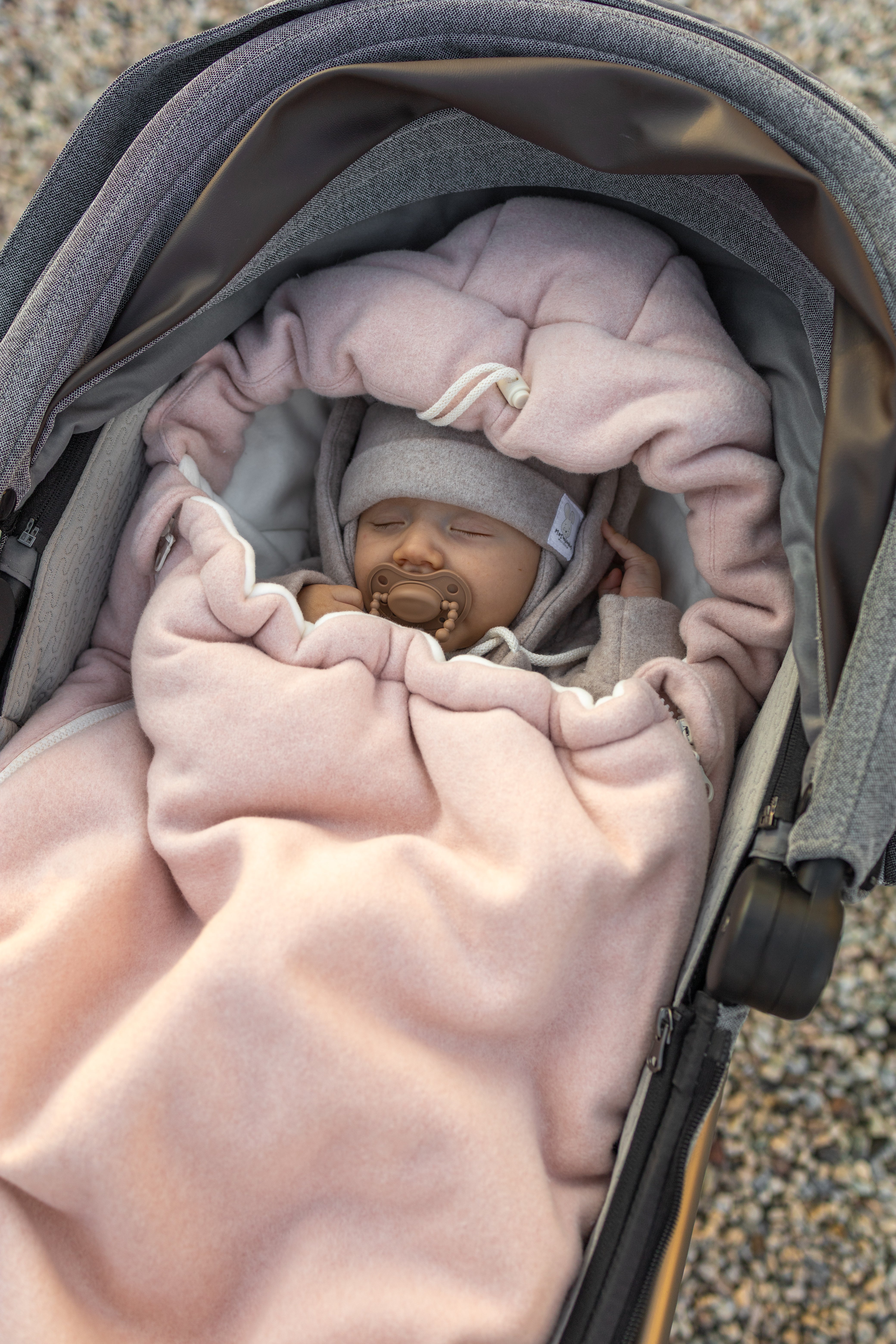 Keep your baby cozy year-round with our 3-in-1 Footmuff – Organic Cotton Baby Stroller Blanket. Soft, breathable, and perfect for strollers. CocoMi Boutique.