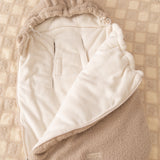 Keep your baby warm and snug with our 3-in-1 plush lamb footmuff. Soft, versatile, and perfect for strollers, car seats, or travel.