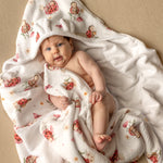 Wrap your baby in gentle comfort with our luxury bamboo baby towel. Made from bamboo terry and cotton muslin, it's hypoallergenic, and OEKO-TEX certified.