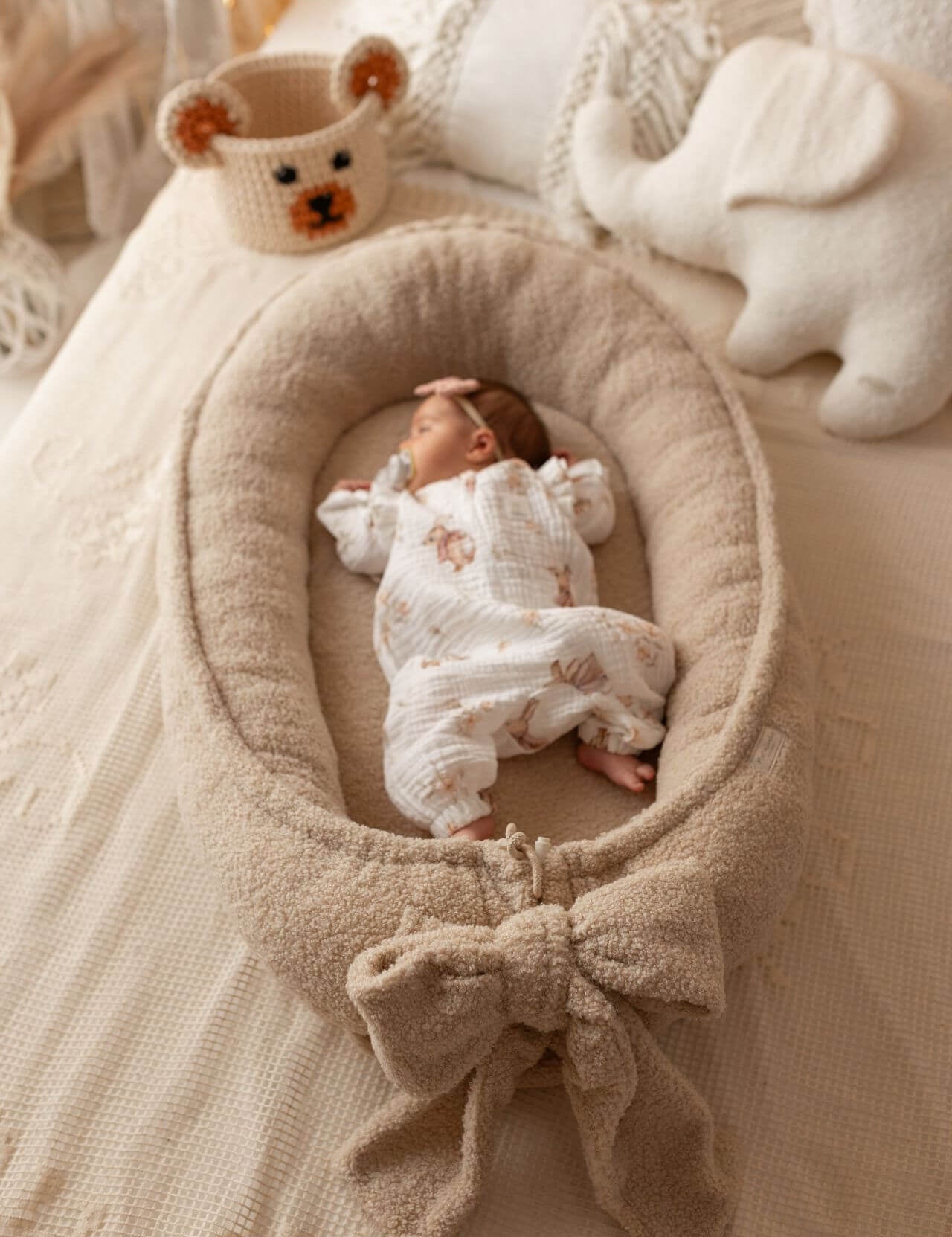 Keep your baby cozy with our Sherpa Baby Nest. Plush, safe, and comfortable—ideal for home, travel, or as a thoughtful gift. Soft & Secure Baby Sleeper.