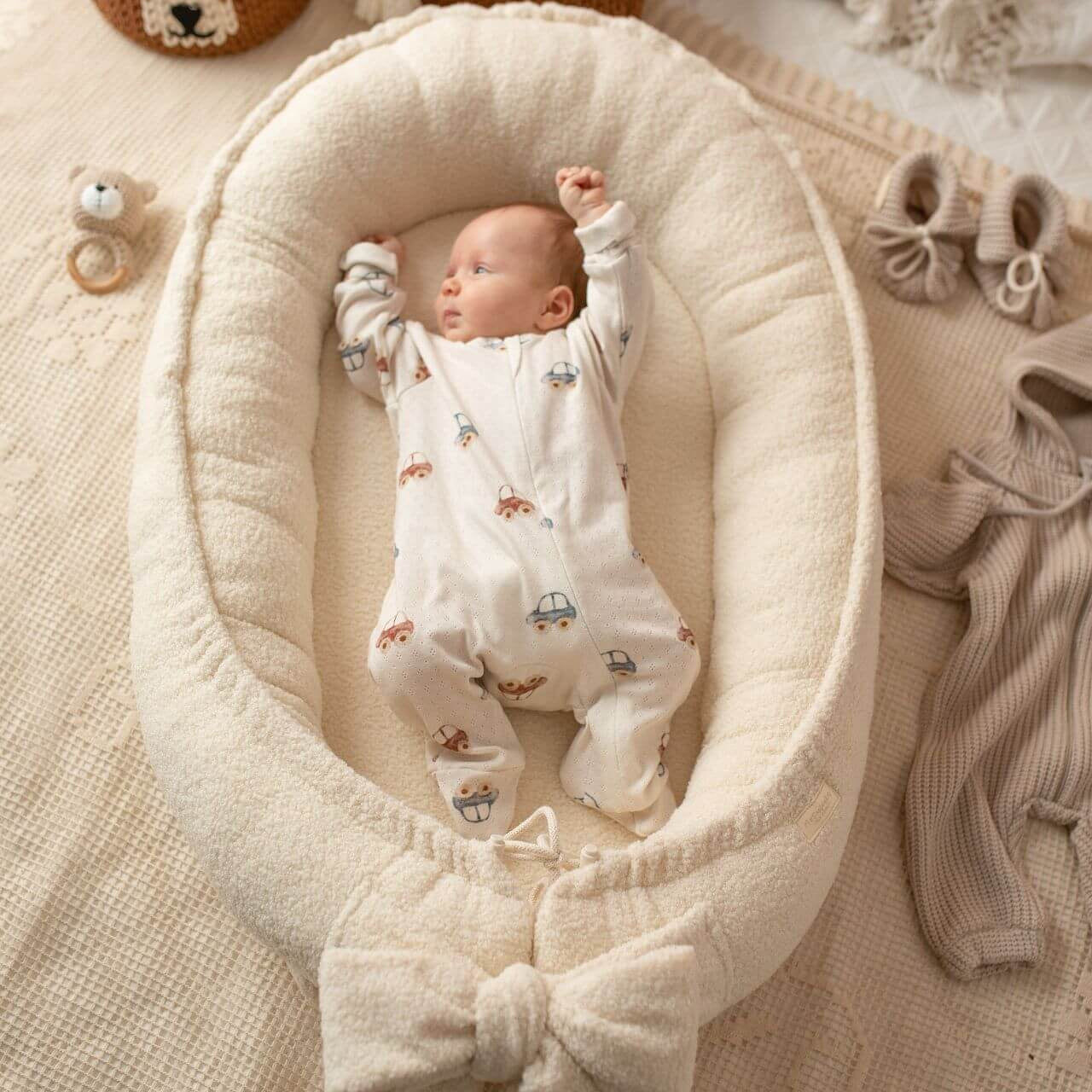 Keep your baby cozy with our Sherpa Baby Nest. Plush, safe, and comfortable—ideal for home, travel, or as a thoughtful gift. Soft & Secure Baby Sleeper.
