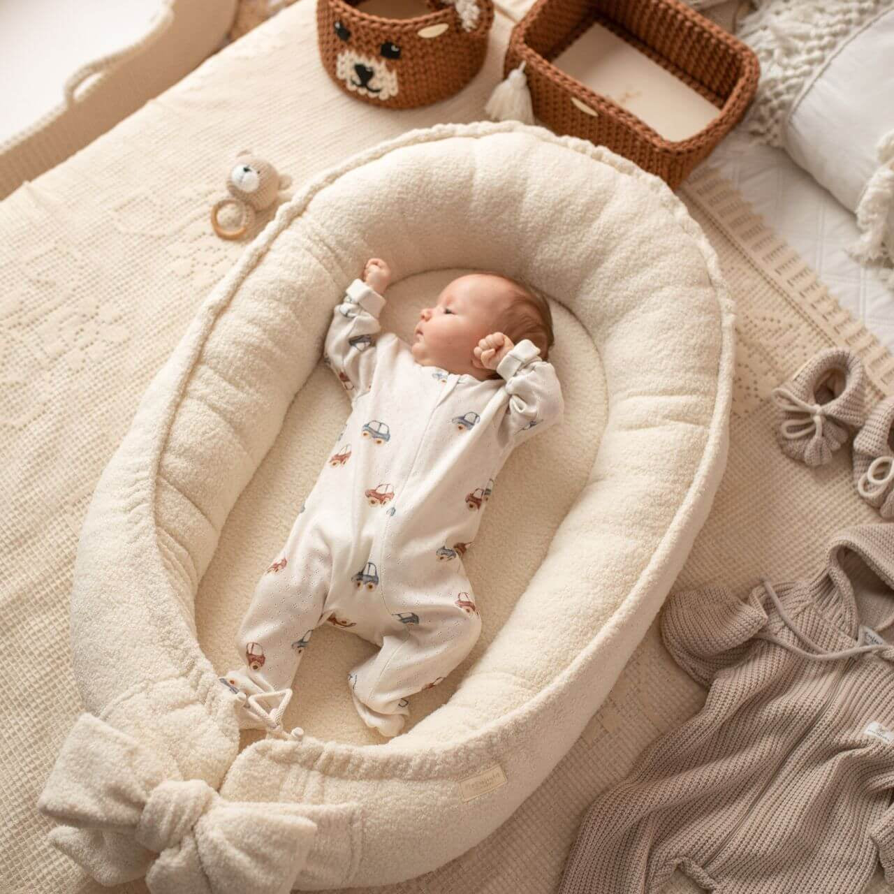 Keep your baby cozy with our Sherpa Baby Nest. Plush, safe, and comfortable—ideal for home, travel, or as a thoughtful gift. Soft & Secure Baby Sleeper.