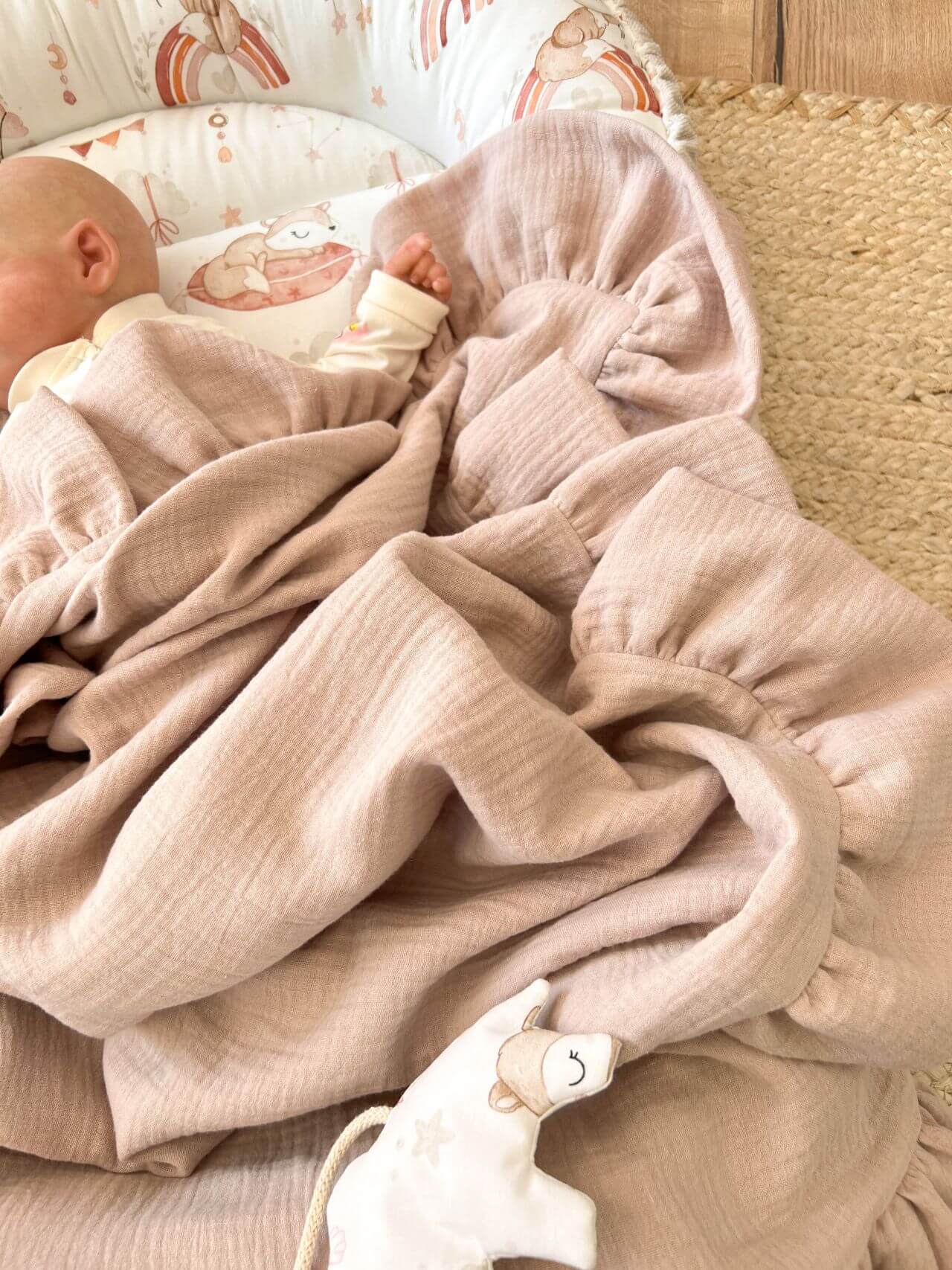 Wrap your baby in softness with our OEKO-TEX® certified muslin swaddle blanket. Ultra-lightweight, breathable, and gentle on sensitive skin. Shop muslin blanket