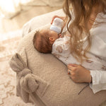 Support your baby and yourself with the Ultimate Nursing Pillow in soft Sherpa fabric. Ergonomic, cozy, and perfect for feeding or lounging.