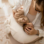 Support your baby and yourself with the Ultimate Nursing Pillow in soft Sherpa fabric. Ergonomic, cozy, and perfect for feeding or lounging.