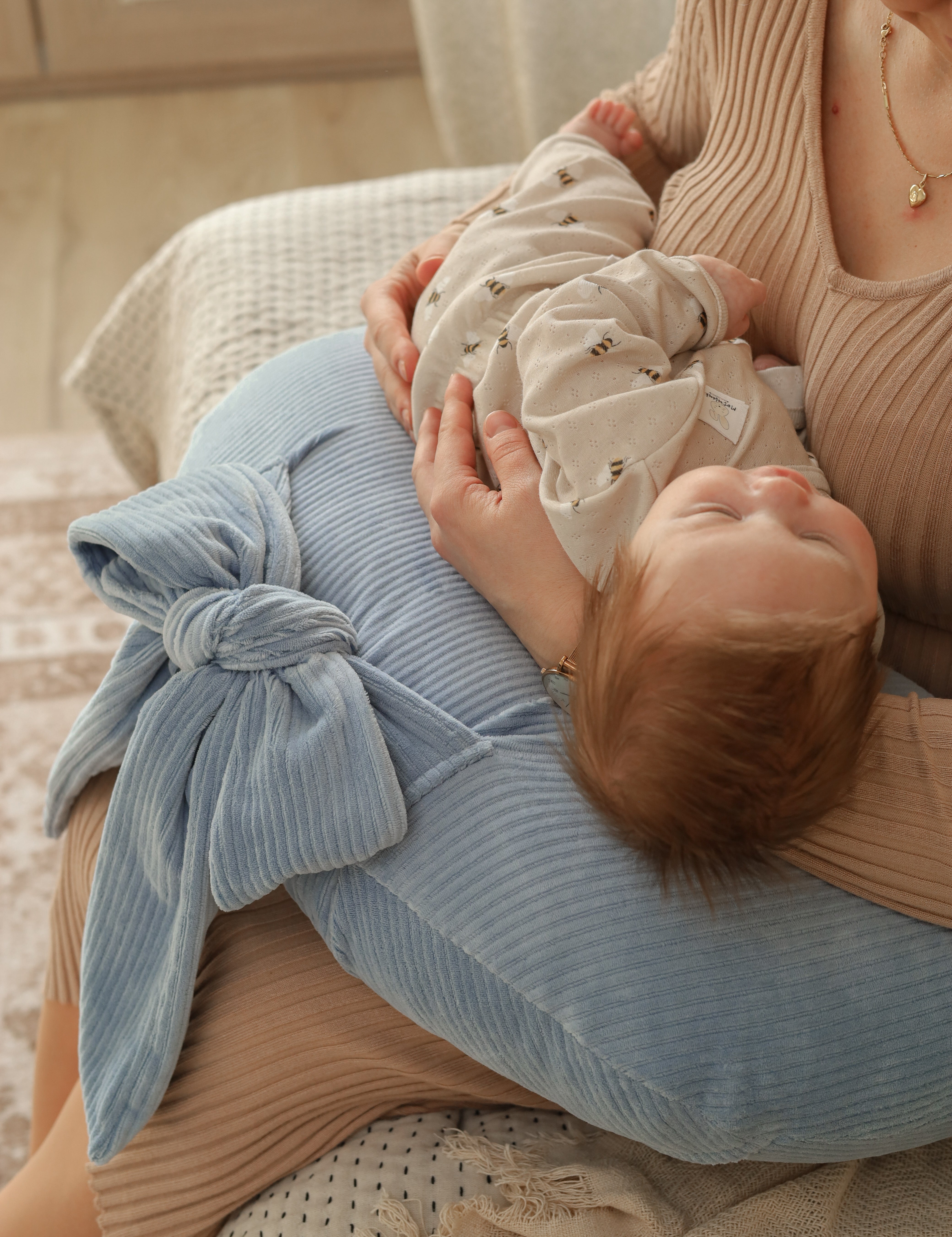 Experience effortless feeding with our Ultimate Comfort Nursing Pillow. Ergonomic design and plush fabric provide support for both baby and parent.