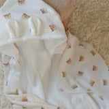 Wrap your baby in gentle comfort with our luxury bamboo baby towel. Made from bamboo terry and cotton muslin, it's hypoallergenic, and OEKO-TEX certified.