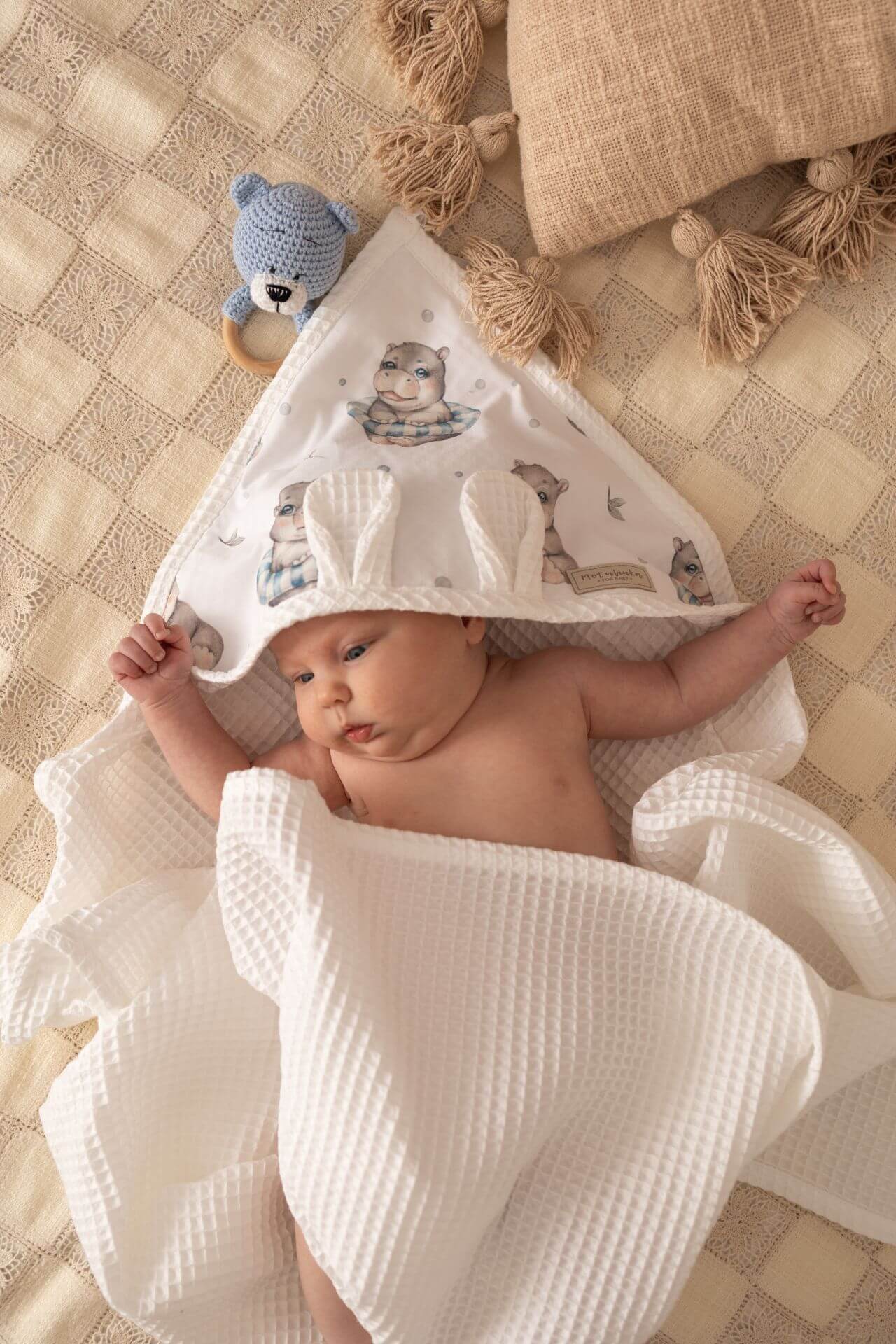 Wrap your little one in comfort with our Waffle Baby Hooded Bath Towel. Made from 100% natural cotton, it's ultra-soft, breathable, quick-drying.