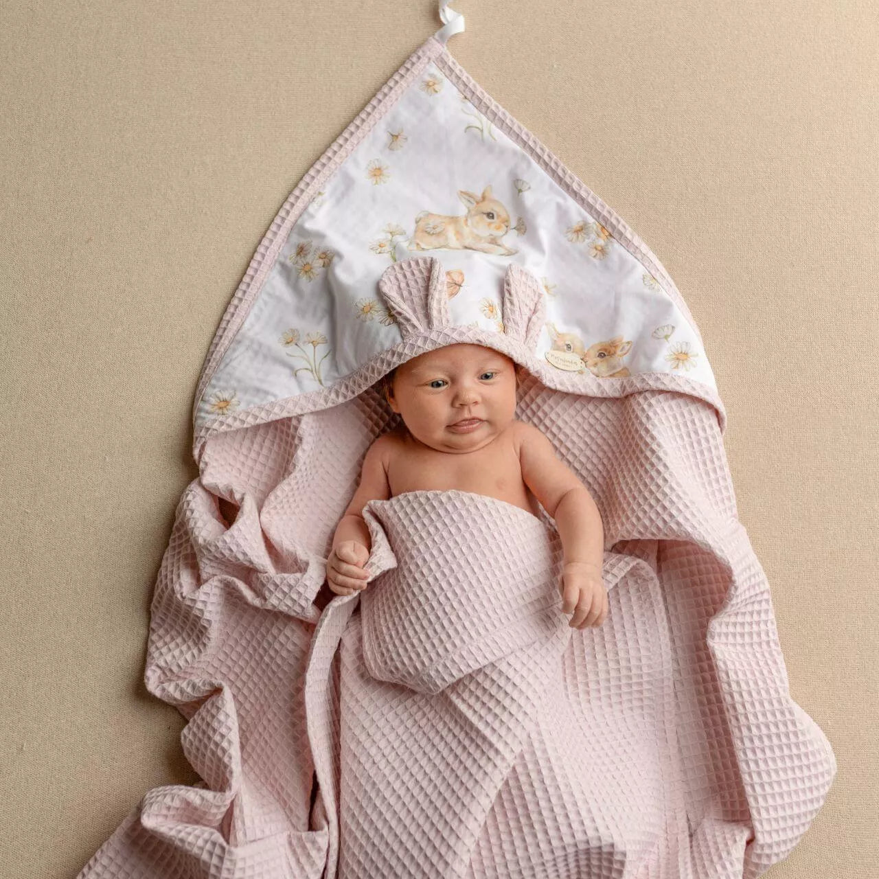 Wrap your little one in comfort with our Waffle Baby Hooded Bath Towel. Made from 100% natural cotton, it's ultra-soft, breathable, quick-drying.