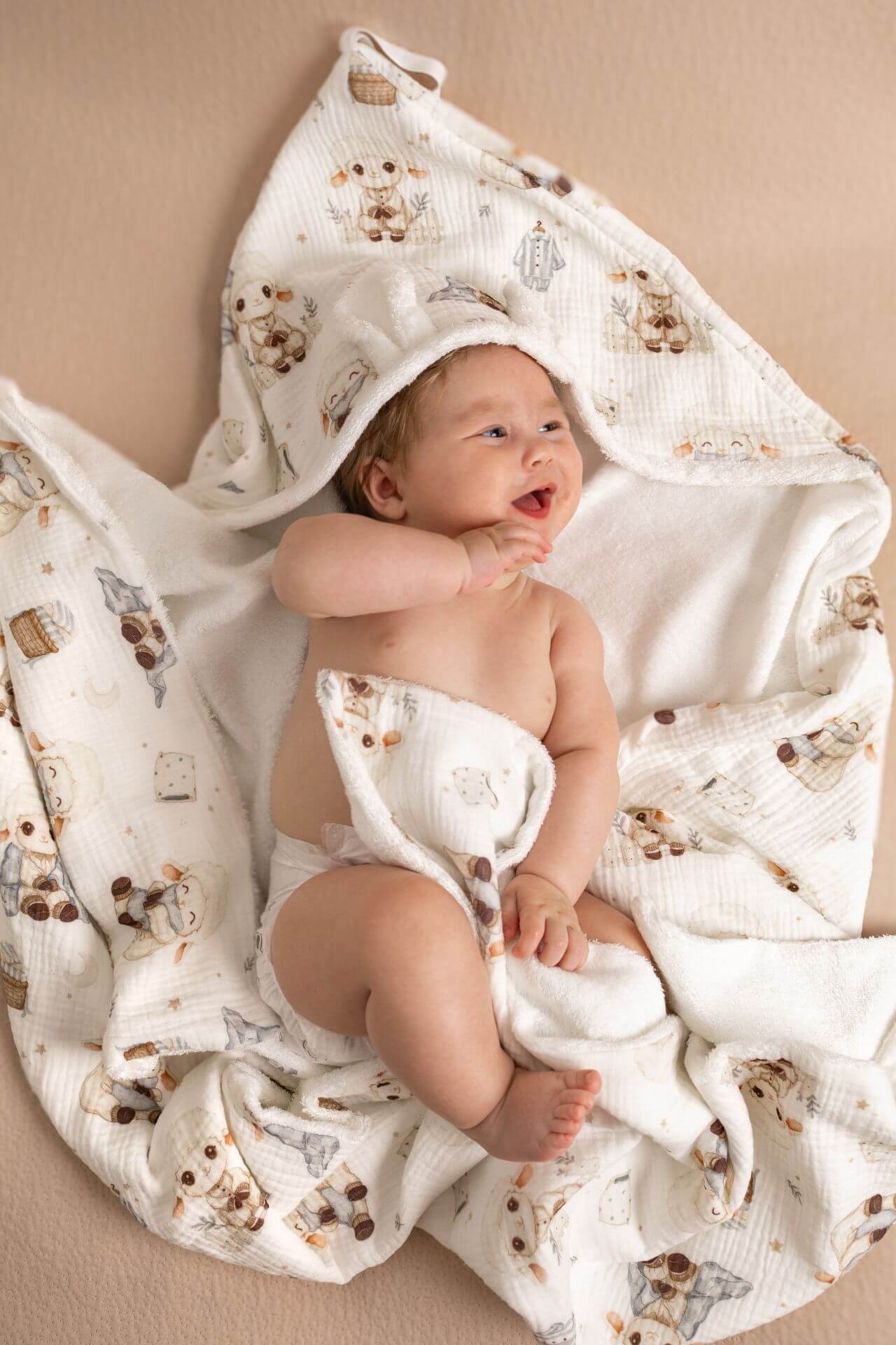 Wrap your baby in gentle comfort with our luxury bamboo baby towel. Made from bamboo terry and cotton muslin, it's hypoallergenic, and OEKO-TEX certified.