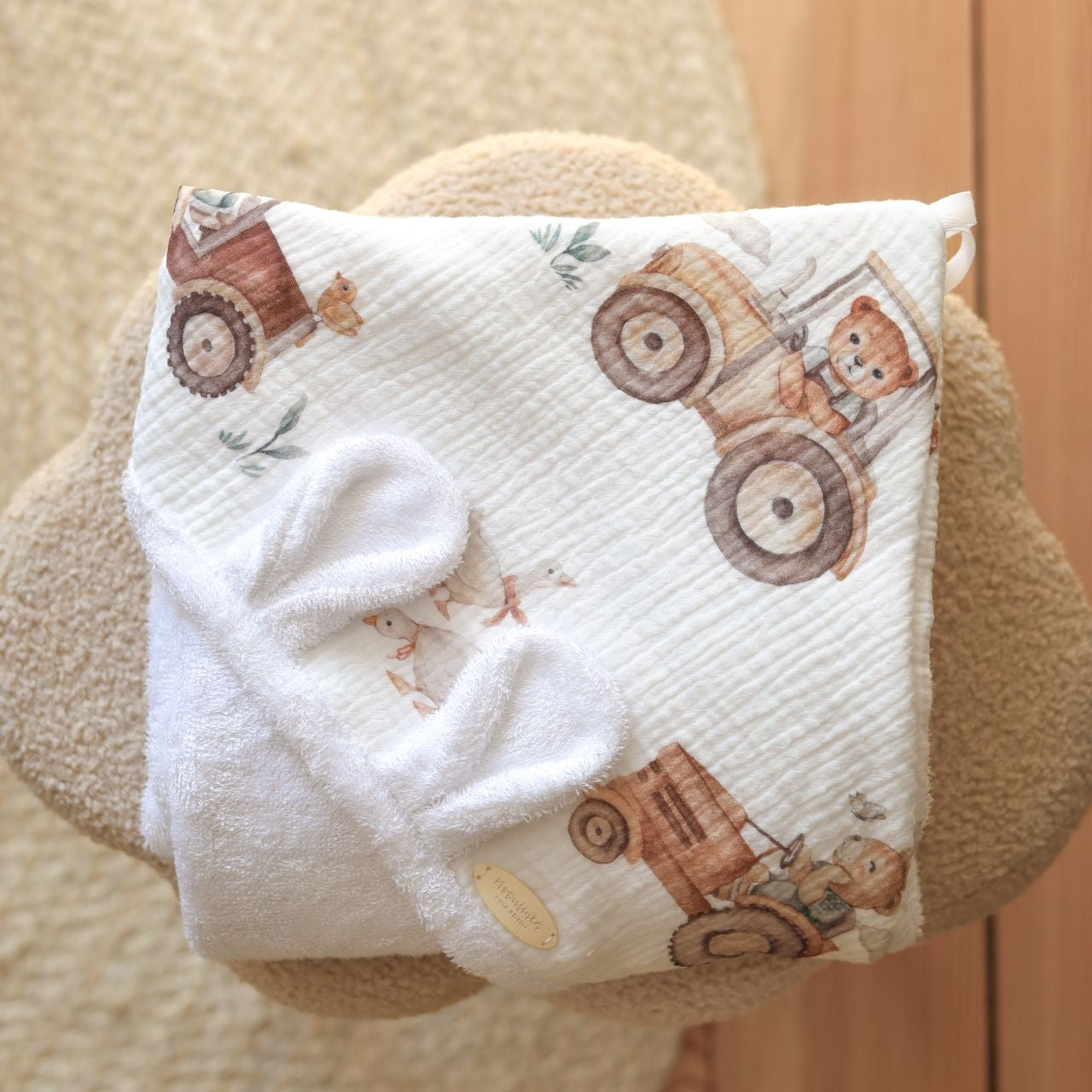 Wrap your baby in gentle comfort with our luxury bamboo baby towel. Made from bamboo terry and cotton muslin, it's hypoallergenic, and OEKO-TEX certified.