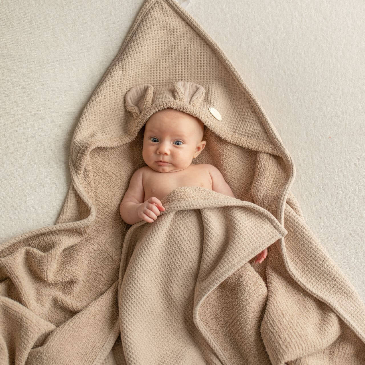 Keep your little one cozy with our Baby Terry Towel. Ultra-soft, highly absorbent, and gentle on delicate skin – perfect for bath time and everyday use.