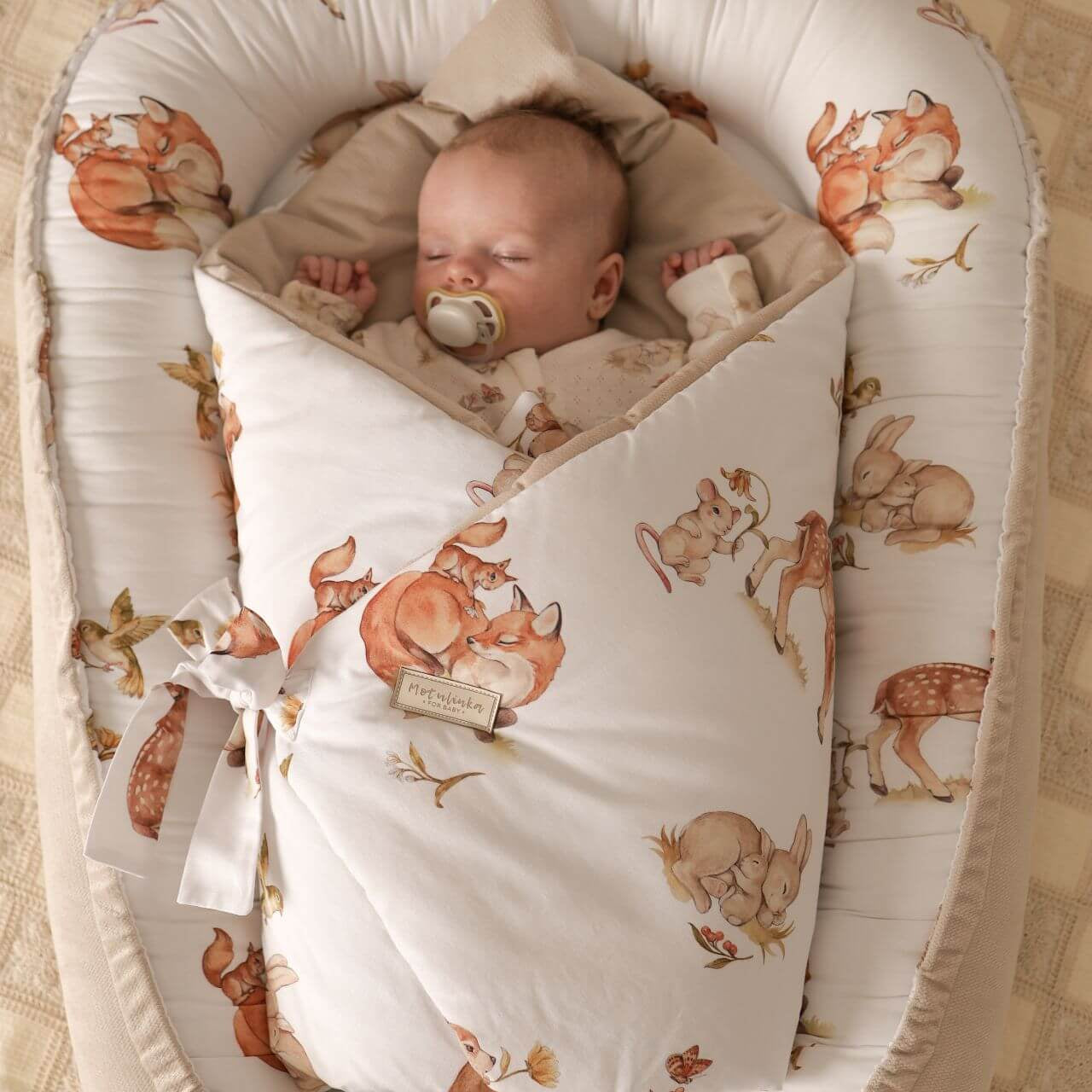 Wrap your baby in luxury with our Organic Cotton Swaddle Blanket. Made with 100% premium cotton, soft velvet lining & hypoallergenic fill.