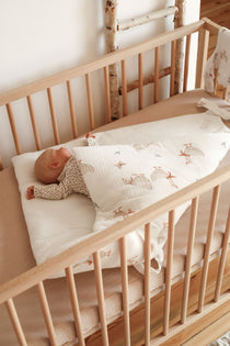 Discover our organic baby wrap crafted from breathable, OEKO-TEX® certified muslin with hypoallergenic filling. Perfect for swaddling, playtime. Muslin Swaddle Wrap